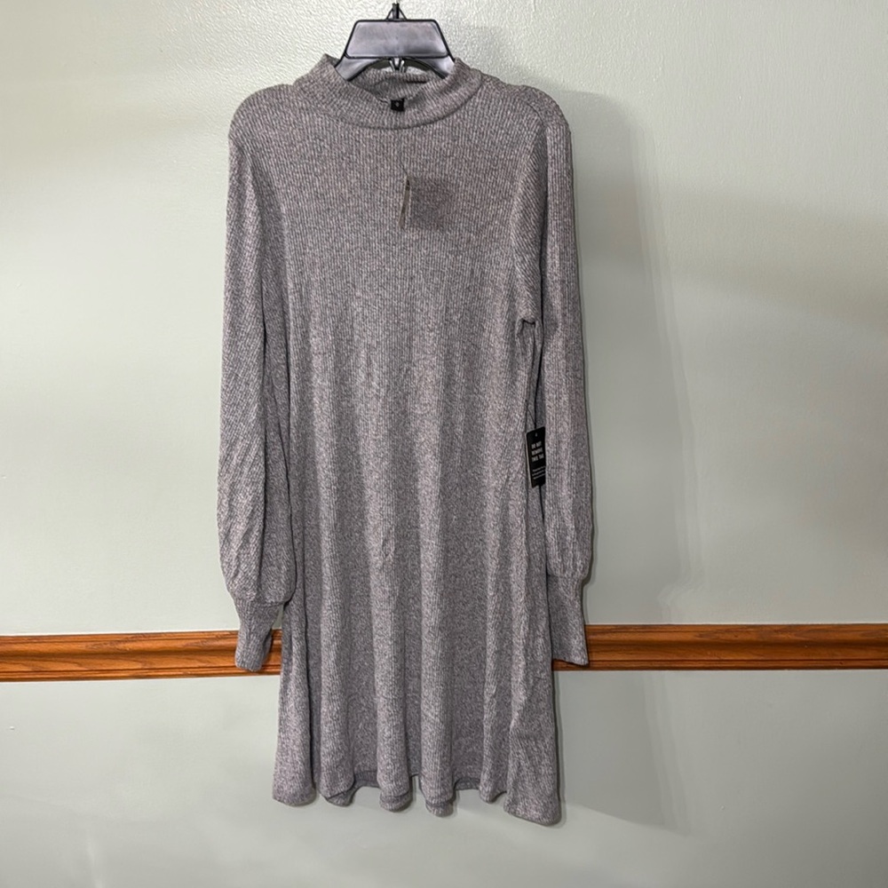 Express bell sleeve seater dress. Size: medium. NWT. Flare bottom ribbed.